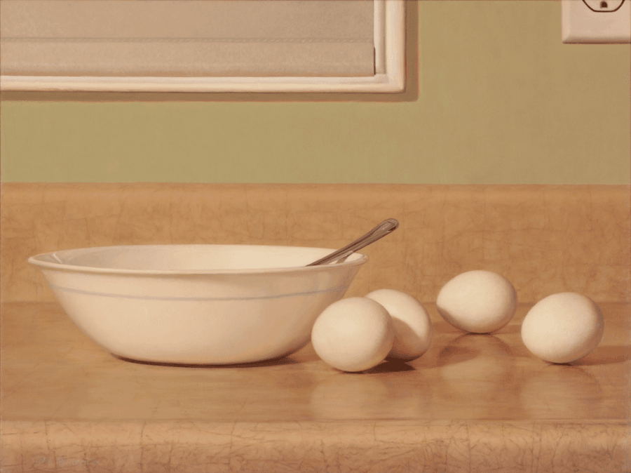 A realist still life oil painting on panel titled 'Eggs,' measuring 11 1/4 inches by 15 inches. An empty except for a metal fork a medium sized, white toned glass bowl, four white eggs, resting on a reflective laminate tan colour, counter top surface. The composition is set against a domestic setting, a green wall with a window covered with a pulled down blind and an electrical outlet. A clear directional light from the left creates bright highlights on the curves of the eggs and the rim of the bowl, while casting a clear, sharp reflection of the bowl and its contents on the counter top. Oil painting by John Hansen.