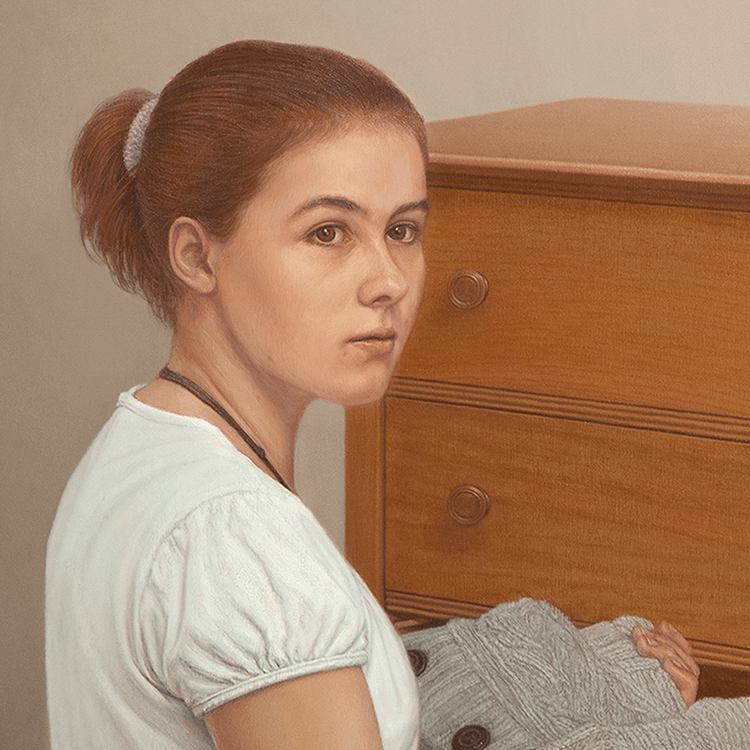 A detailed close-up from the oil painting 'Young Woman at Dresser.' This view focuses on the subject's turned face and the dresser surface. It highlights the painterly rendering of the subtle transitions of light on the young woman's face and hair. The focus emphasizes the simplicity of the interior and the quiet, domestic atmosphere of the scene. Oil painting by John Hansen.