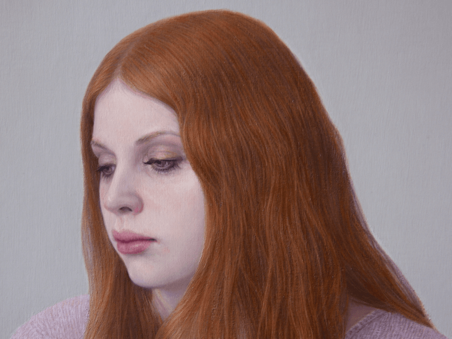 A detailed close-up from the oil painting 'Young Woman at Sewing Table.' This view focuses on the woman’s head and shoulders, highlighting the fine transitions of light on her skin and the intricate, textured brushwork of her long red hair. The soft-focus background emphasizes the quiet intensity of her expression as she works. Oil painting by John Hansen.