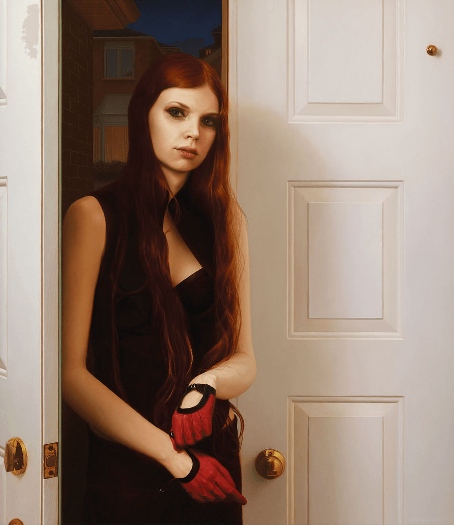 A realist figurative oil painting titled 'Young Woman with Red Gloves,' measuring 37 inches by 32 inches. A young woman with long, vibrant red hair and a direct, steady gaze stands within an open doorway. She wears a dark, sleeveless dress and bright red driving-style gloves, which she appears to be adjusting at her wrist. To the right is a white paneled door with brass hardware, and through the opening to the left, a brick building is visible under a deep blue evening sky. The lighting is soft and directional, highlighting the contours of her face and the crisp paneling of the door. Oil painting by John Hansen.