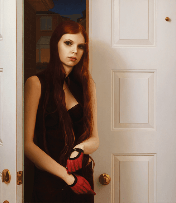 A realist figurative oil painting titled 'Young Woman with Red Gloves,' measuring 37 inches by 32 inches. A young woman with long, vibrant red hair and a direct, steady gaze stands within an open doorway. She wears a dark, sleeveless dress and bright red driving-style gloves, which she appears to be adjusting at her wrist. To the right is a white paneled door with brass hardware, and through the opening to the left, a brick building is visible under a deep blue evening sky. The lighting is soft and directional, highlighting the contours of her face and the crisp paneling of the door. Oil painting by John Hansen.